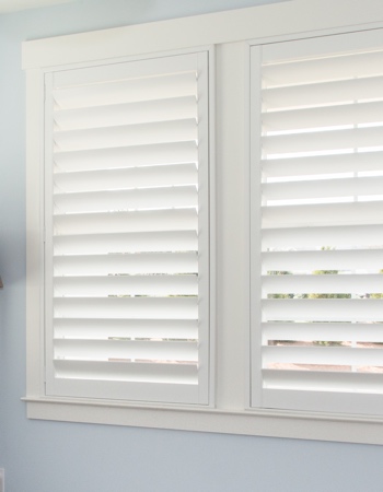 White plantation shutters with hidden tilt rods in Raleigh